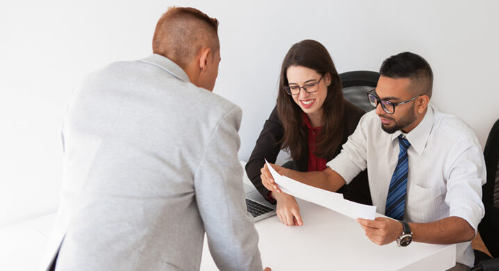 Employy and Staff talking Cover